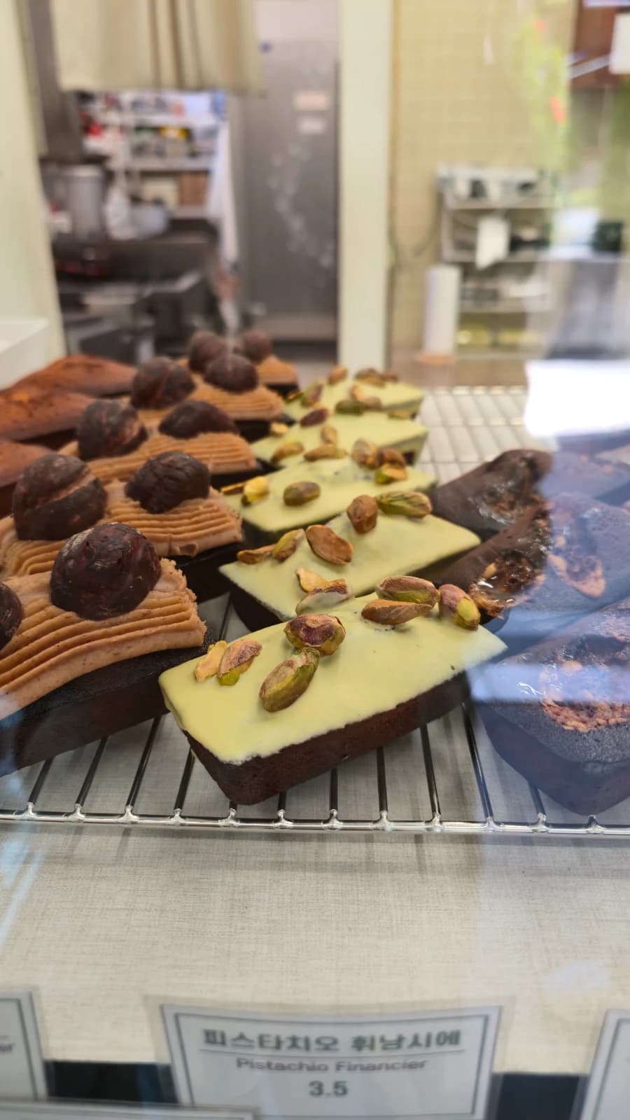 Green Bakery pistachio financier with bright green coating