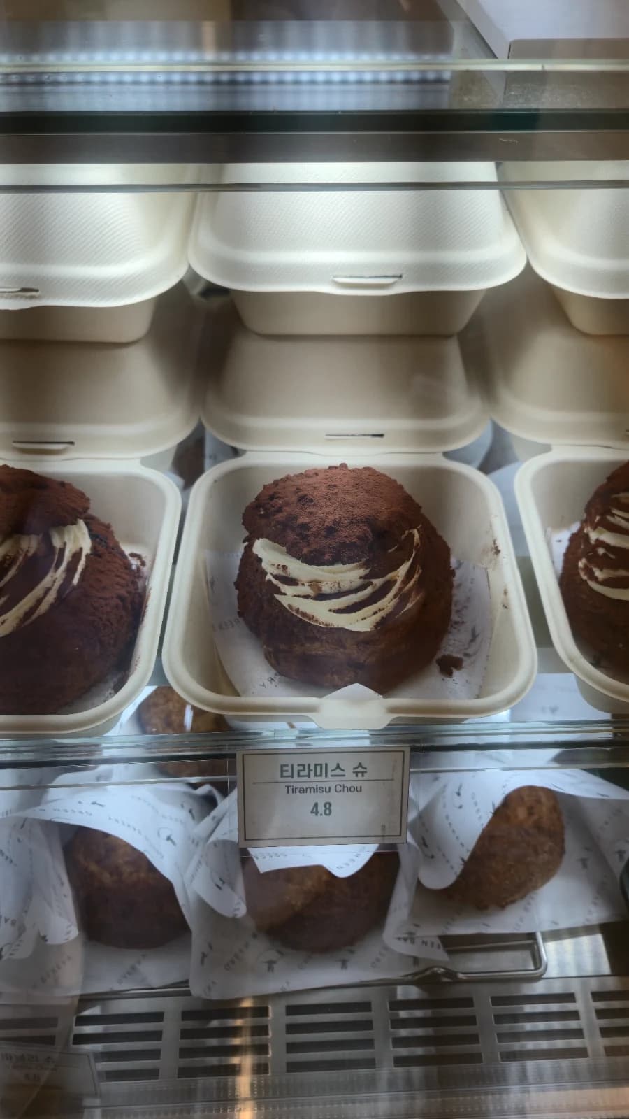 Green Bakery tiramisu choux dusted in cocoa powder