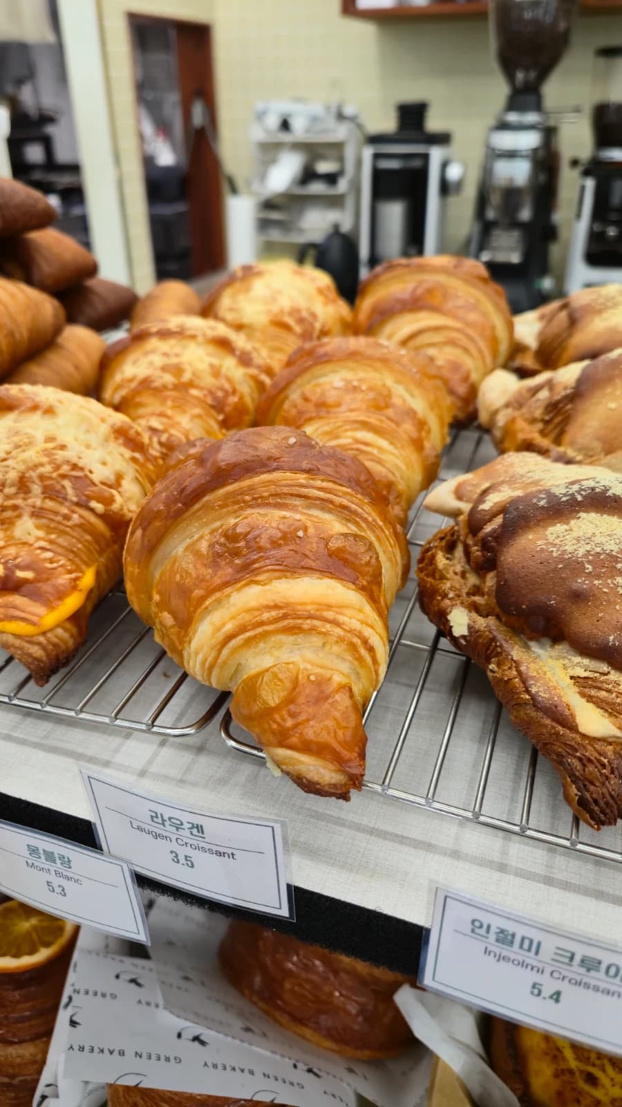 Green Bakery cheese valley croissant and laugen croissant on display