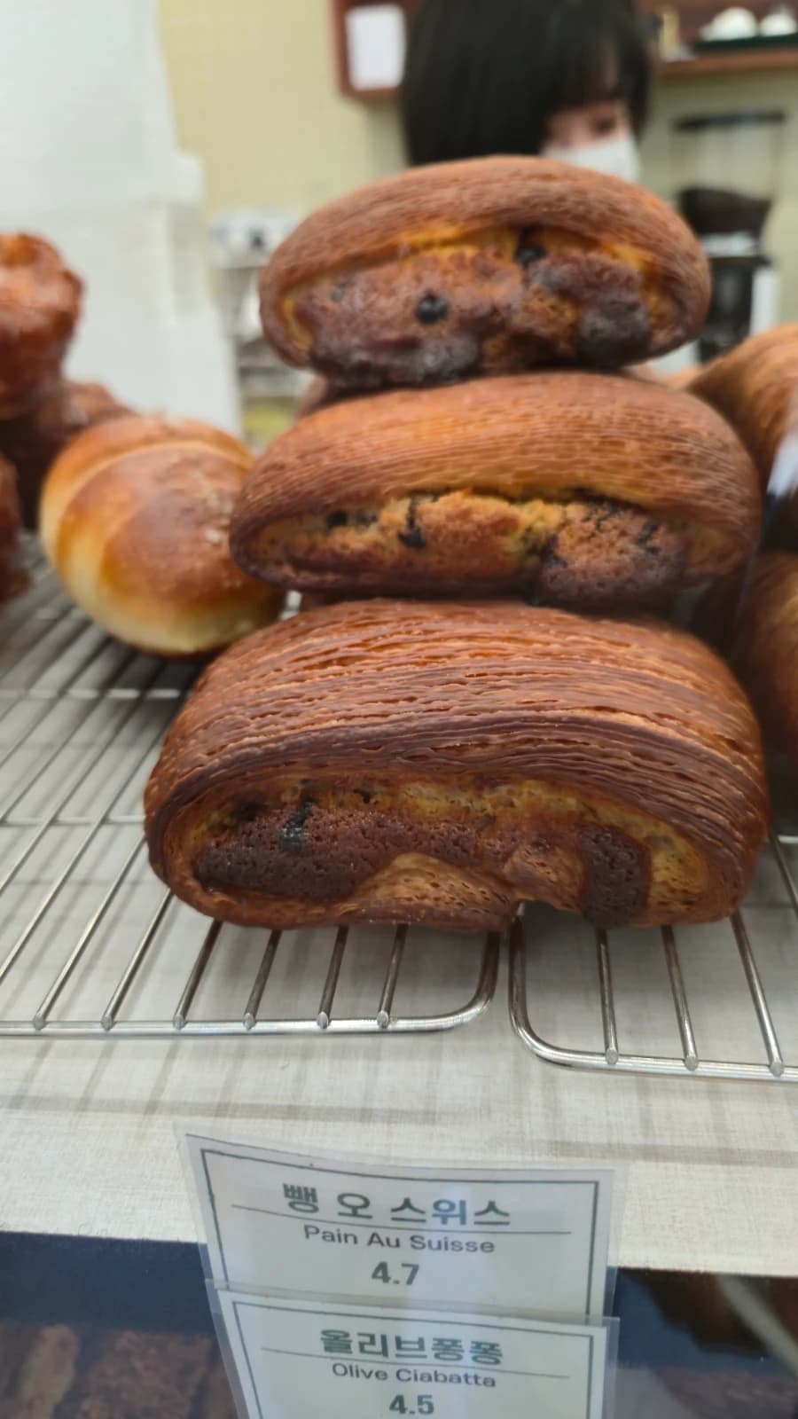 Green Bakery pain au suisse with chocolate swirl cross-section about three forty