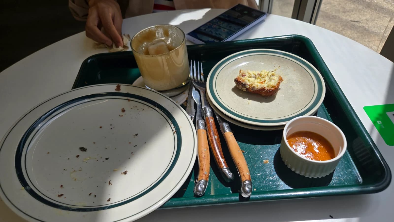 Empty plates after finishing the first round at Green Bakery