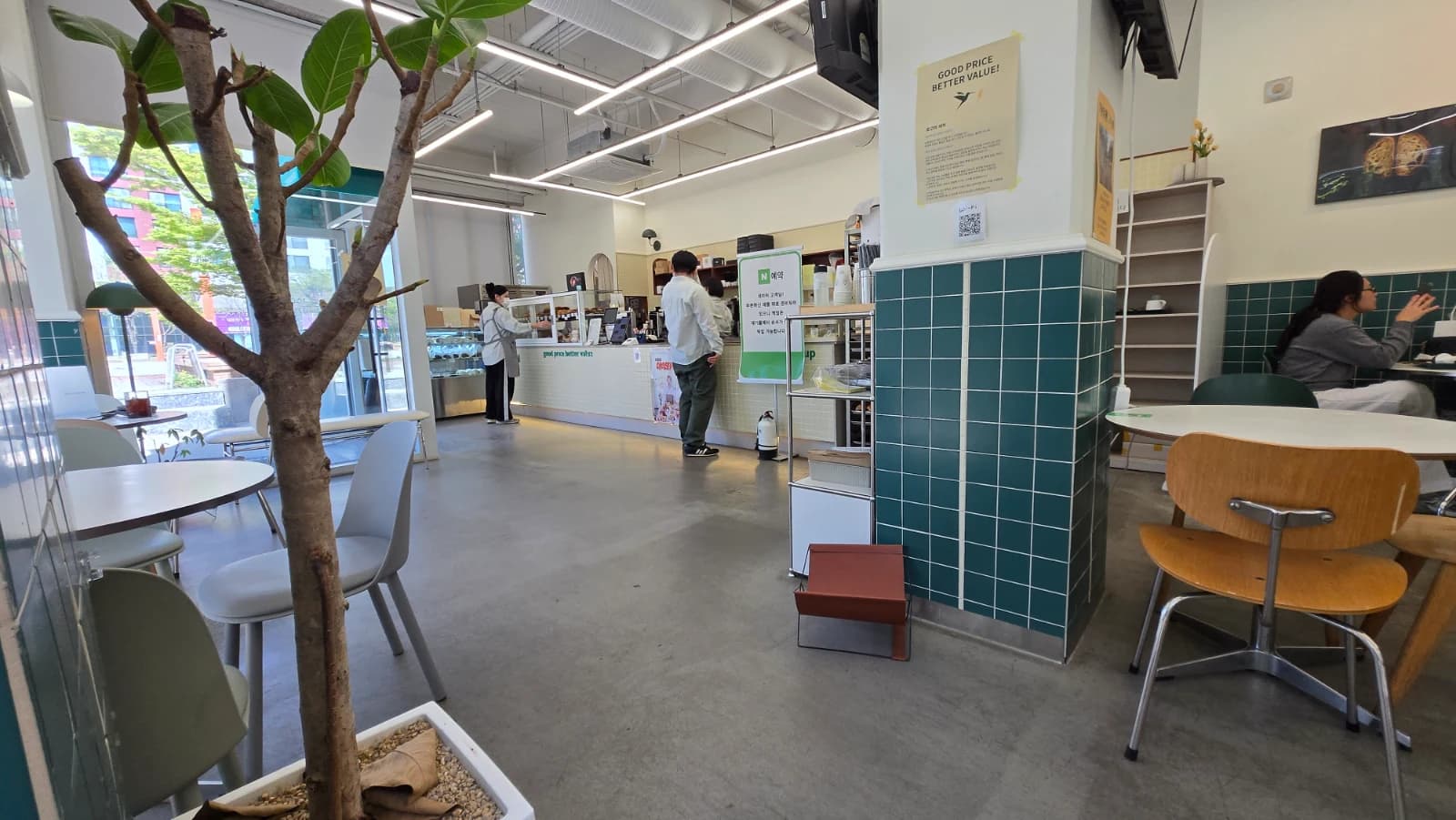 Green Bakery counter with Naver reservation sign for pre-ordering