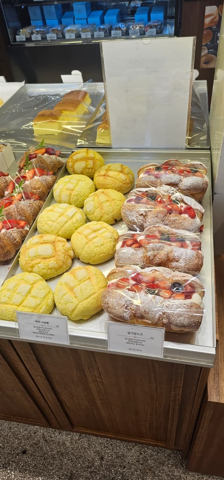 Korean melon cream bread on bakery display