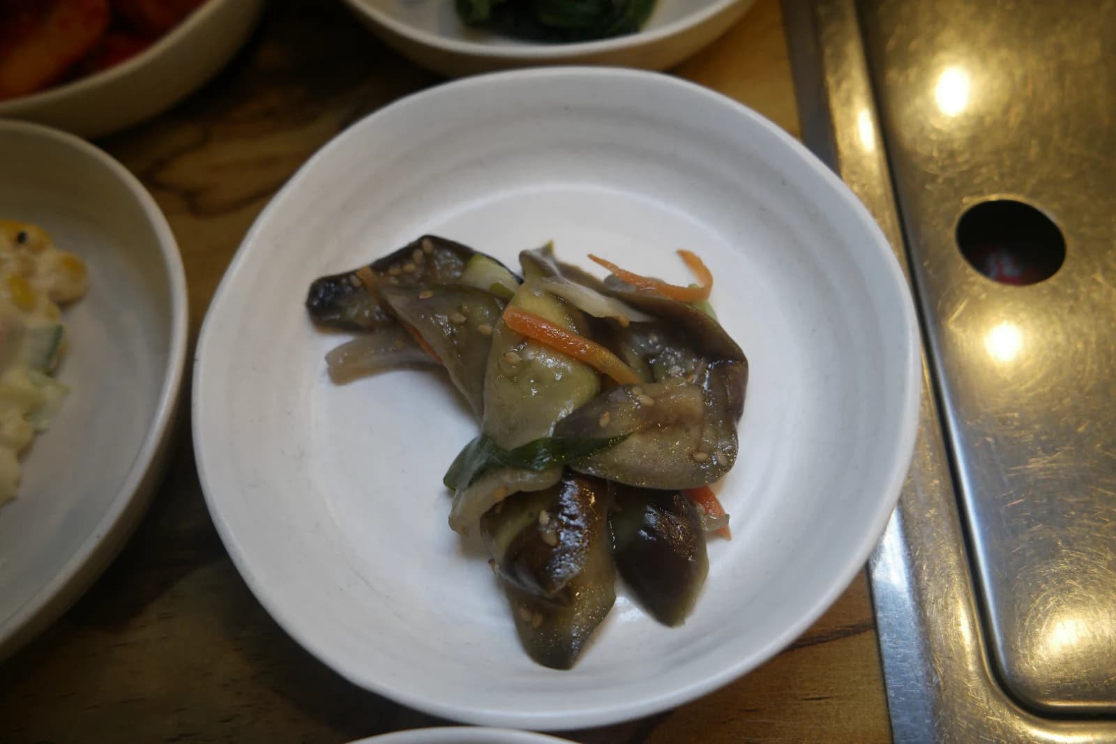 Gaji-namul, Korean seasoned eggplant with sesame oil, seeds, and shredded carrot