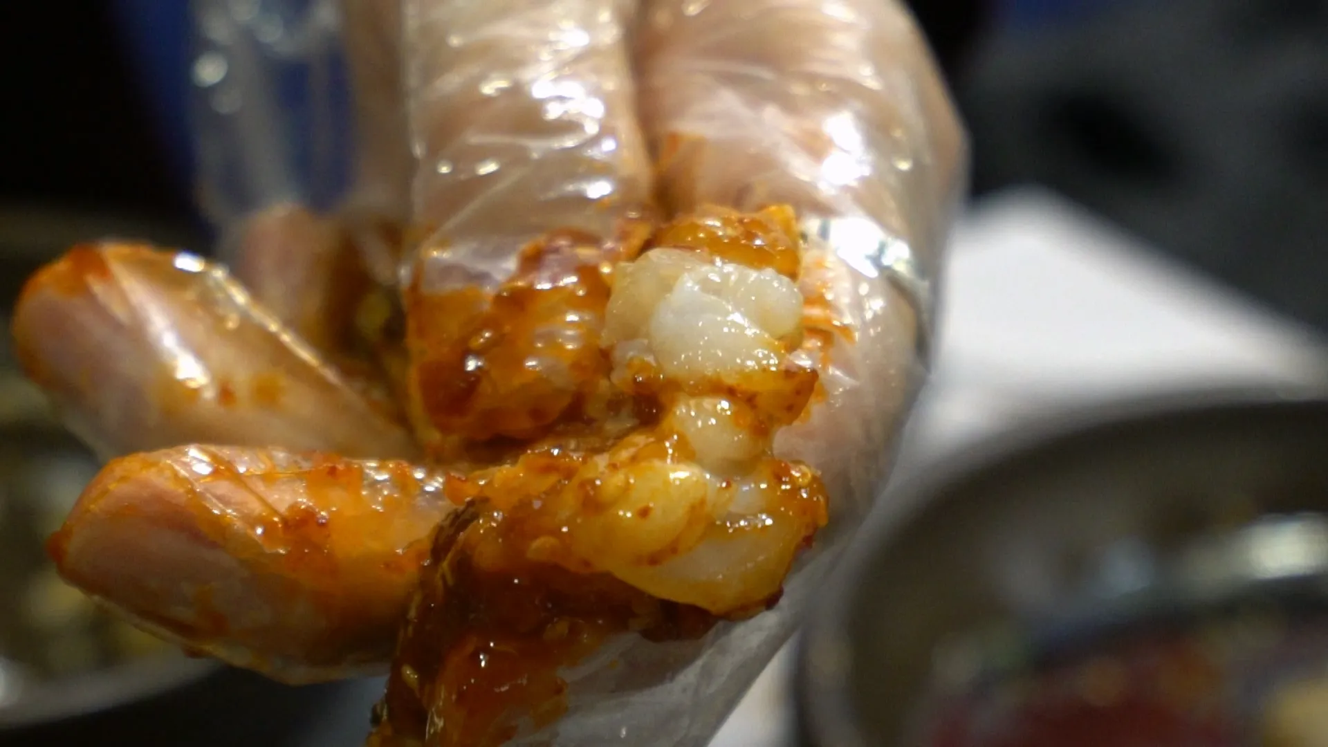 Bowl of white rice topped with a runny fried egg and seaweed at a Korean crab restaurant