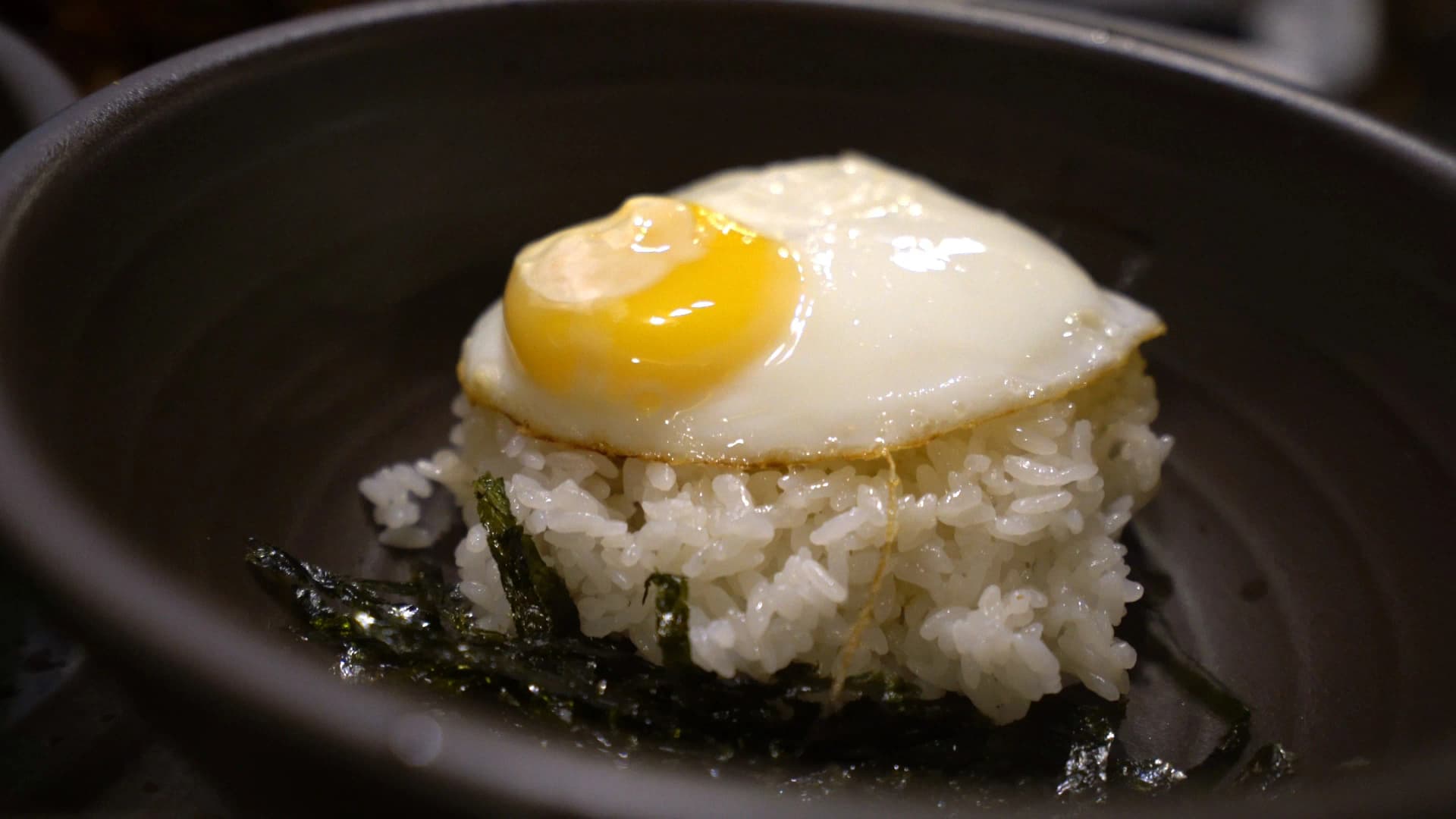 Empty plates and rice bowls on a restaurant table after finishing ganjang gejang and yangnyeom gejang