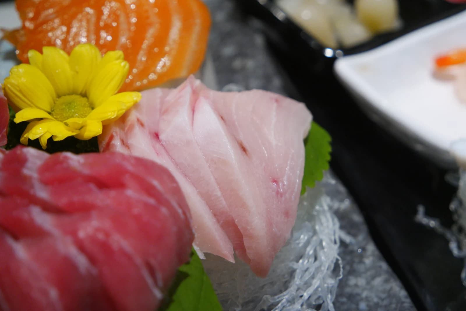 Lean red tuna sashimi, deep crimson with a firm dry texture