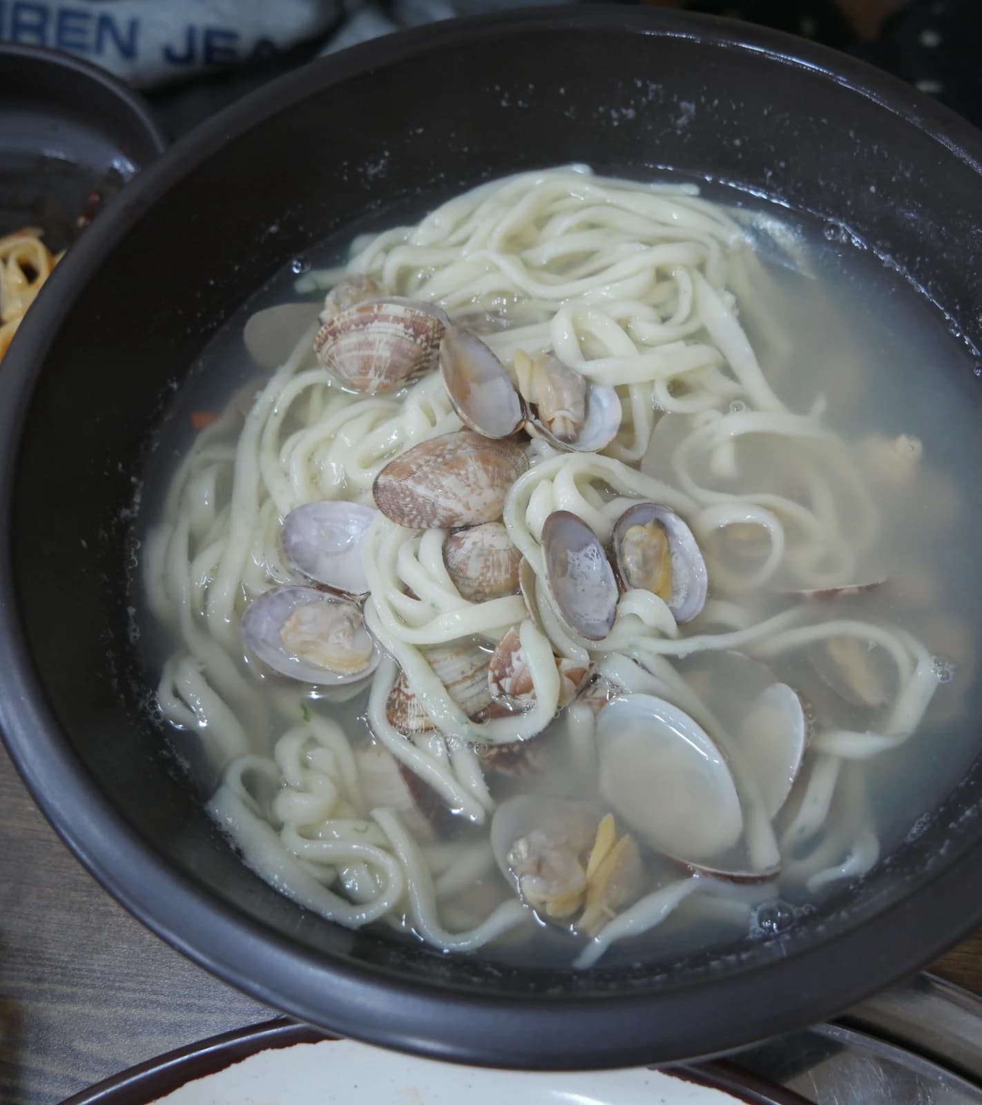 Clam kalguksu broth turned cloudy after eating some of the noodles
