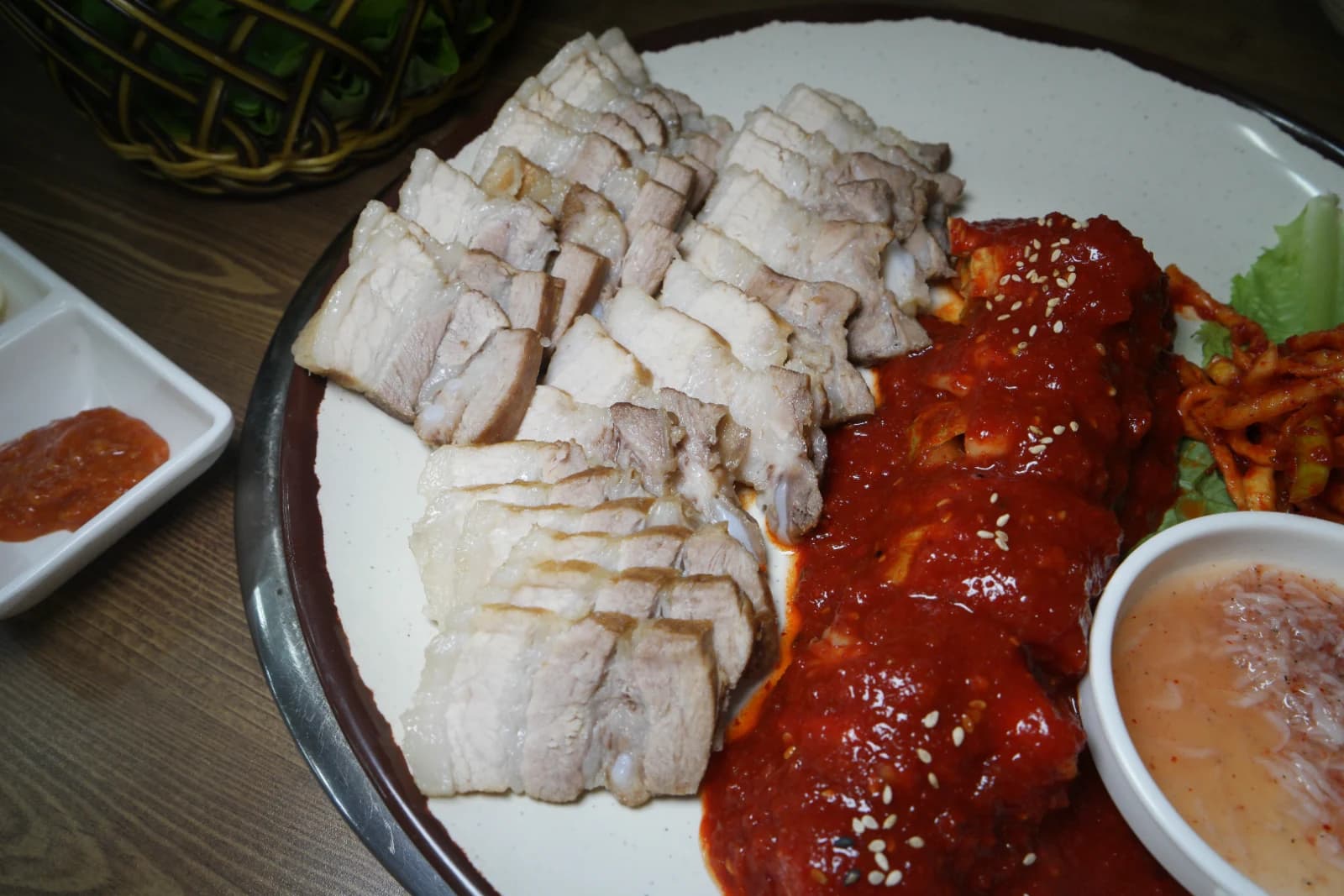 Plate of bossam kimchi soaking in its own juices