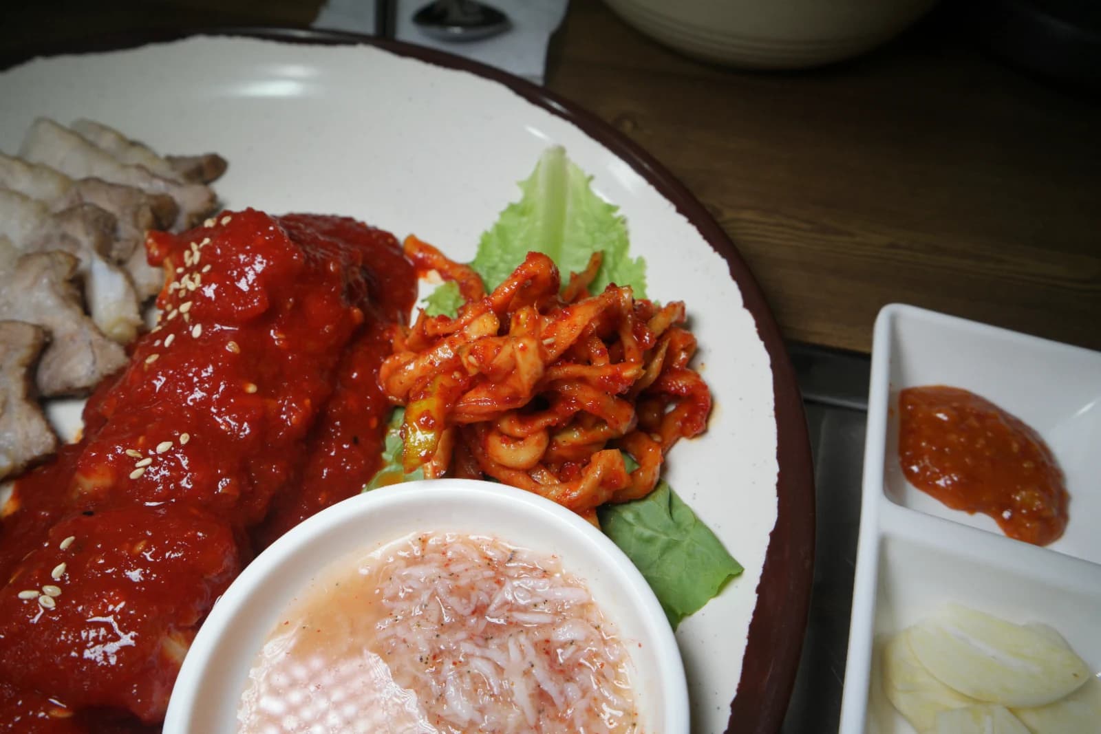 Side dish of dried radish strips seasoned with red chili powder
