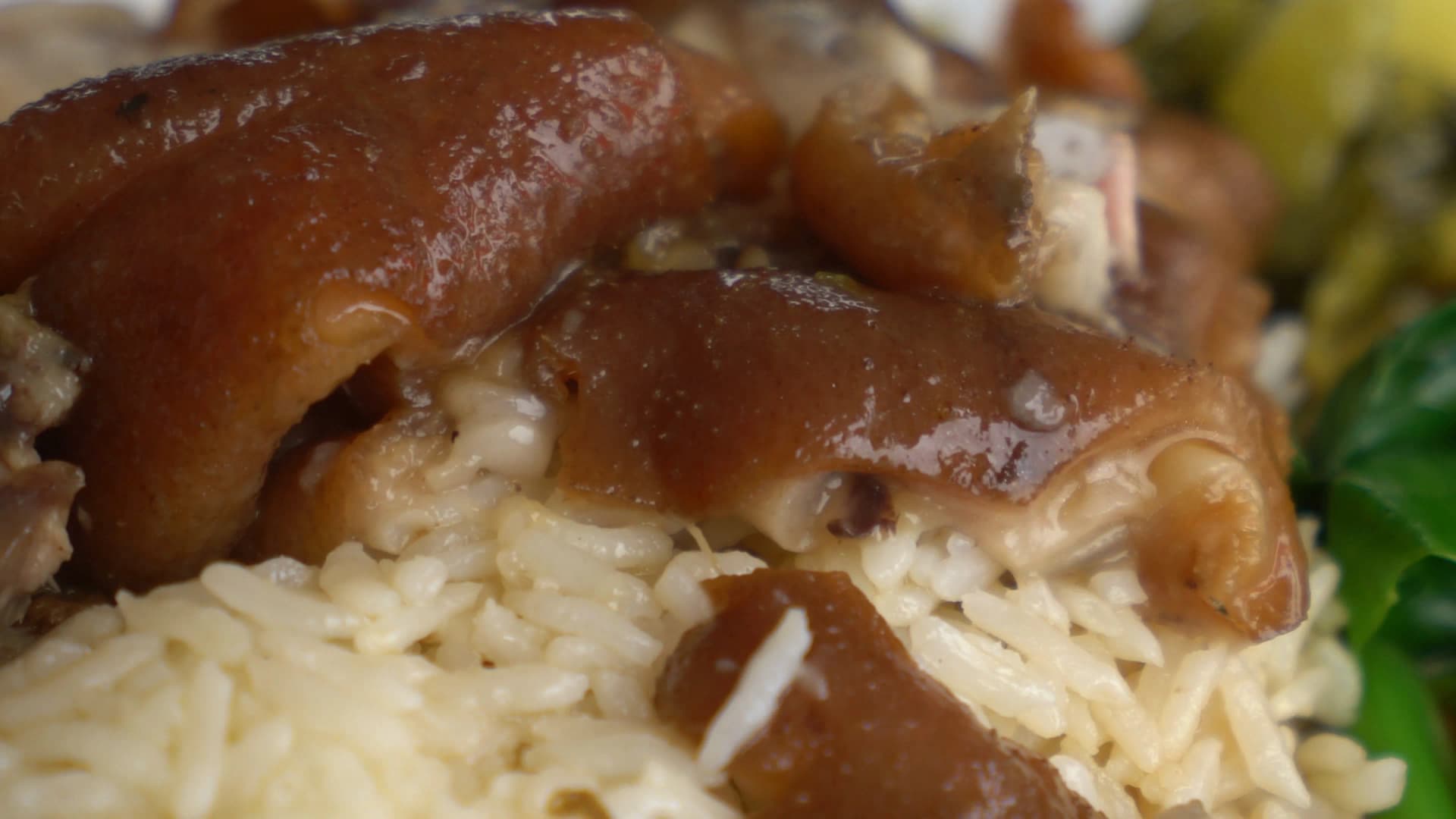 Khao kha moo plated setting with jasmine rice braised pork leg pickled mustard greens and bok choy