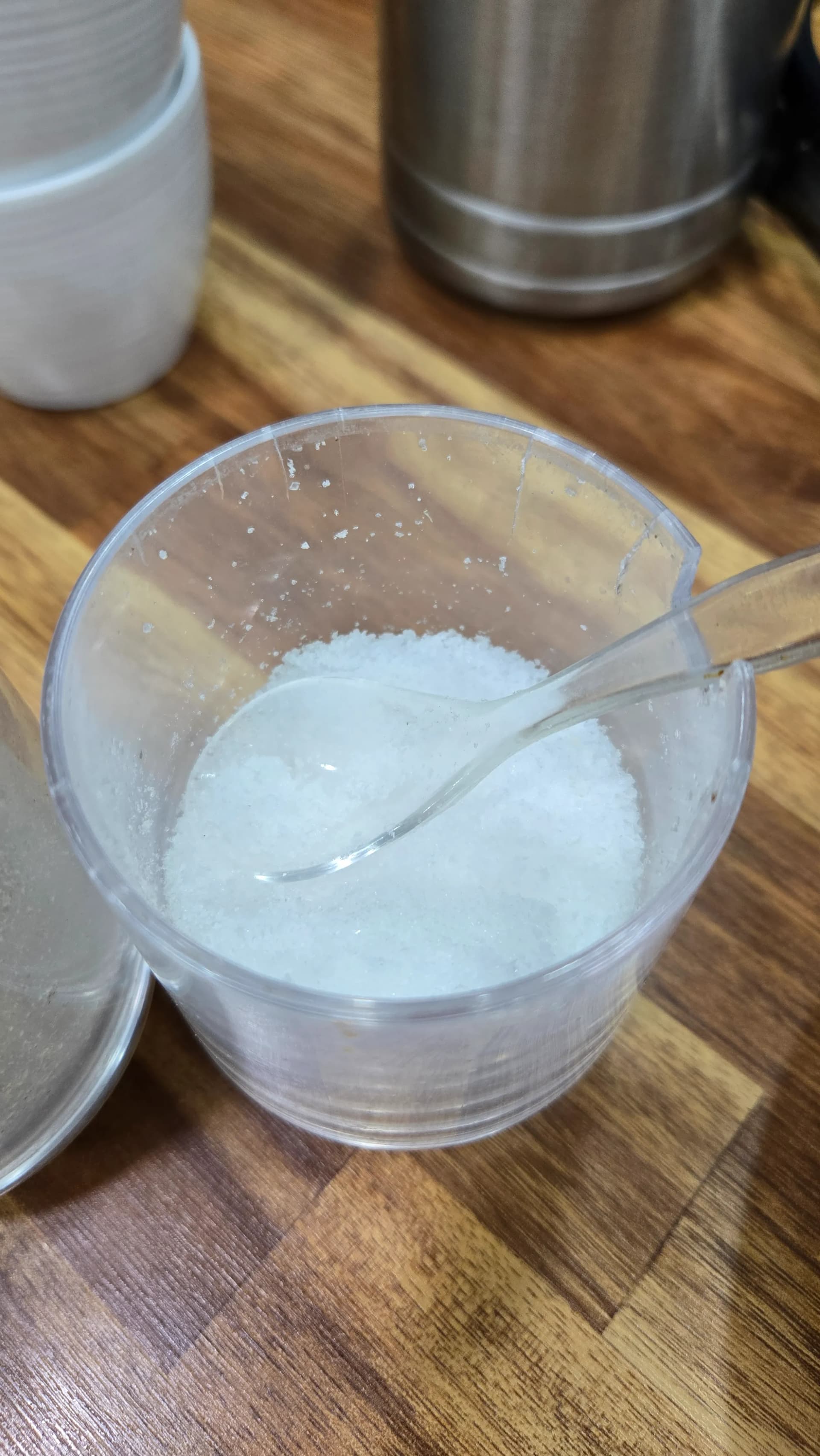 Adding a pinch of salt to sundaegukbap for final seasoning adjustment of the pork bone broth