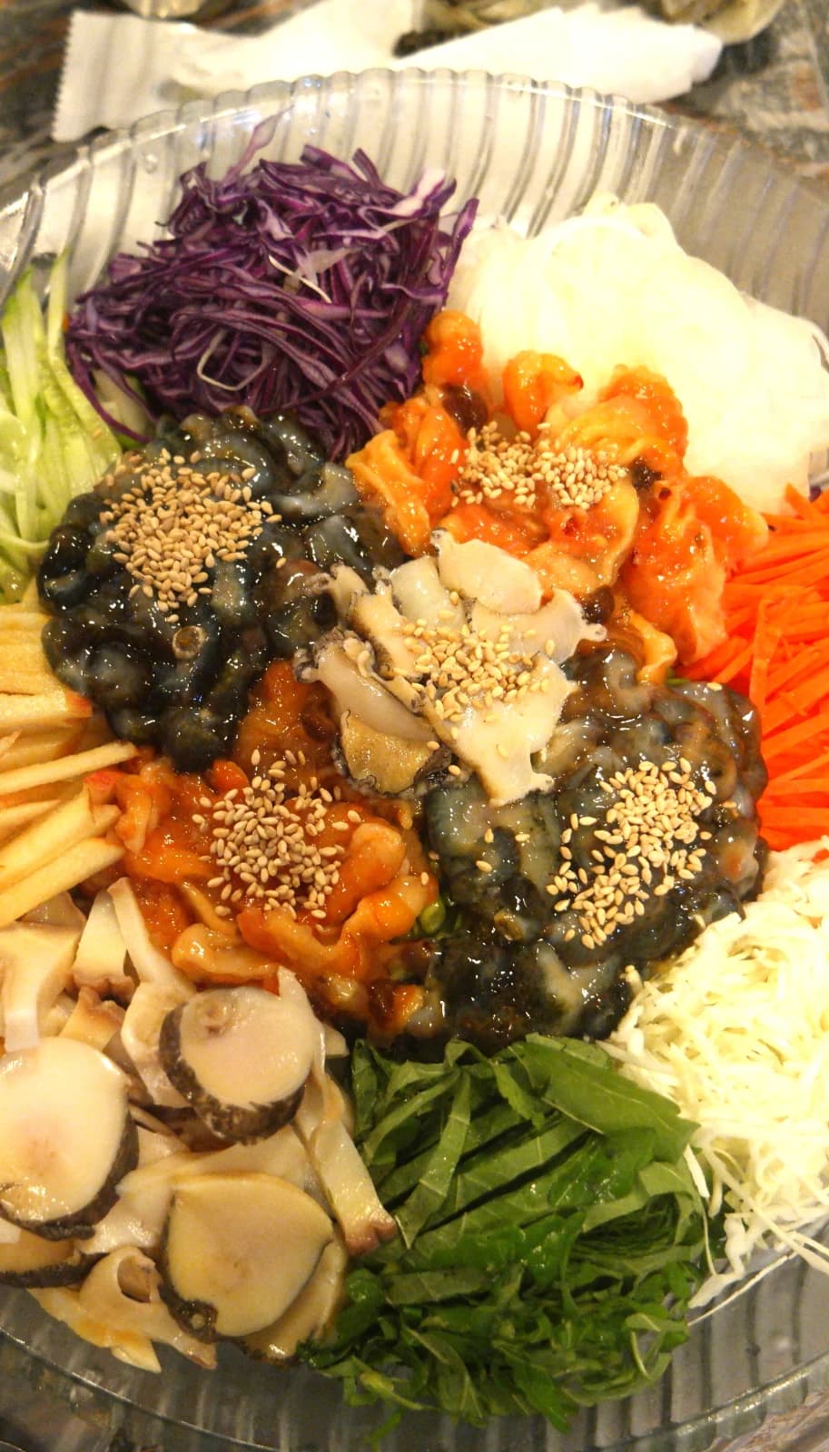 Close-up of mulhoe seafood including sea cucumber, sea squirt, and clam meat