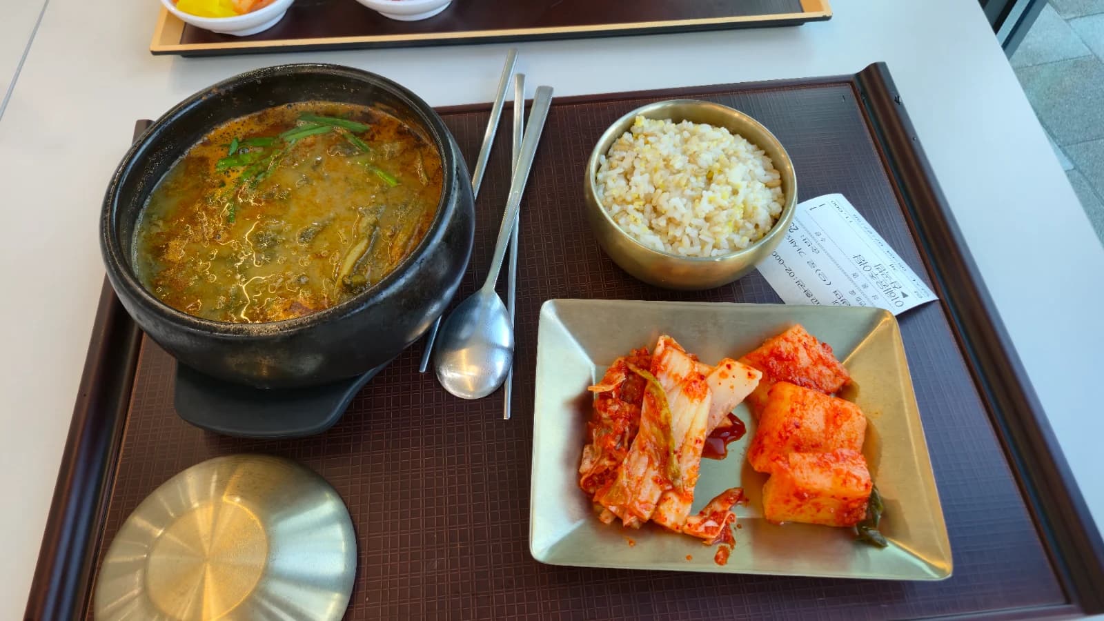Chueotang loach soup tray set with multigrain rice and kimchi side dishes