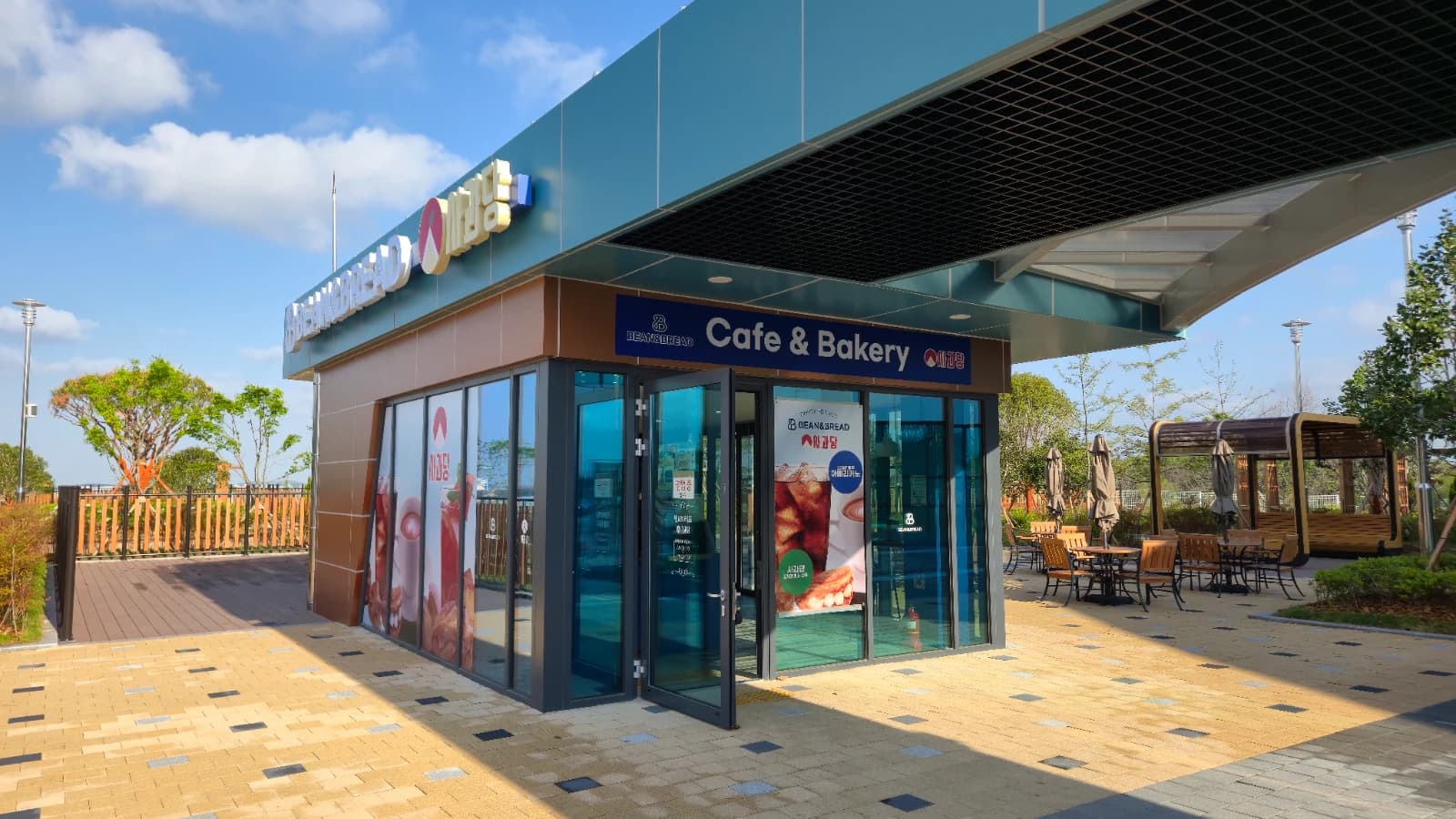 Sagwadang cafe entrance with Cafe and Bakery sign and warm lighting