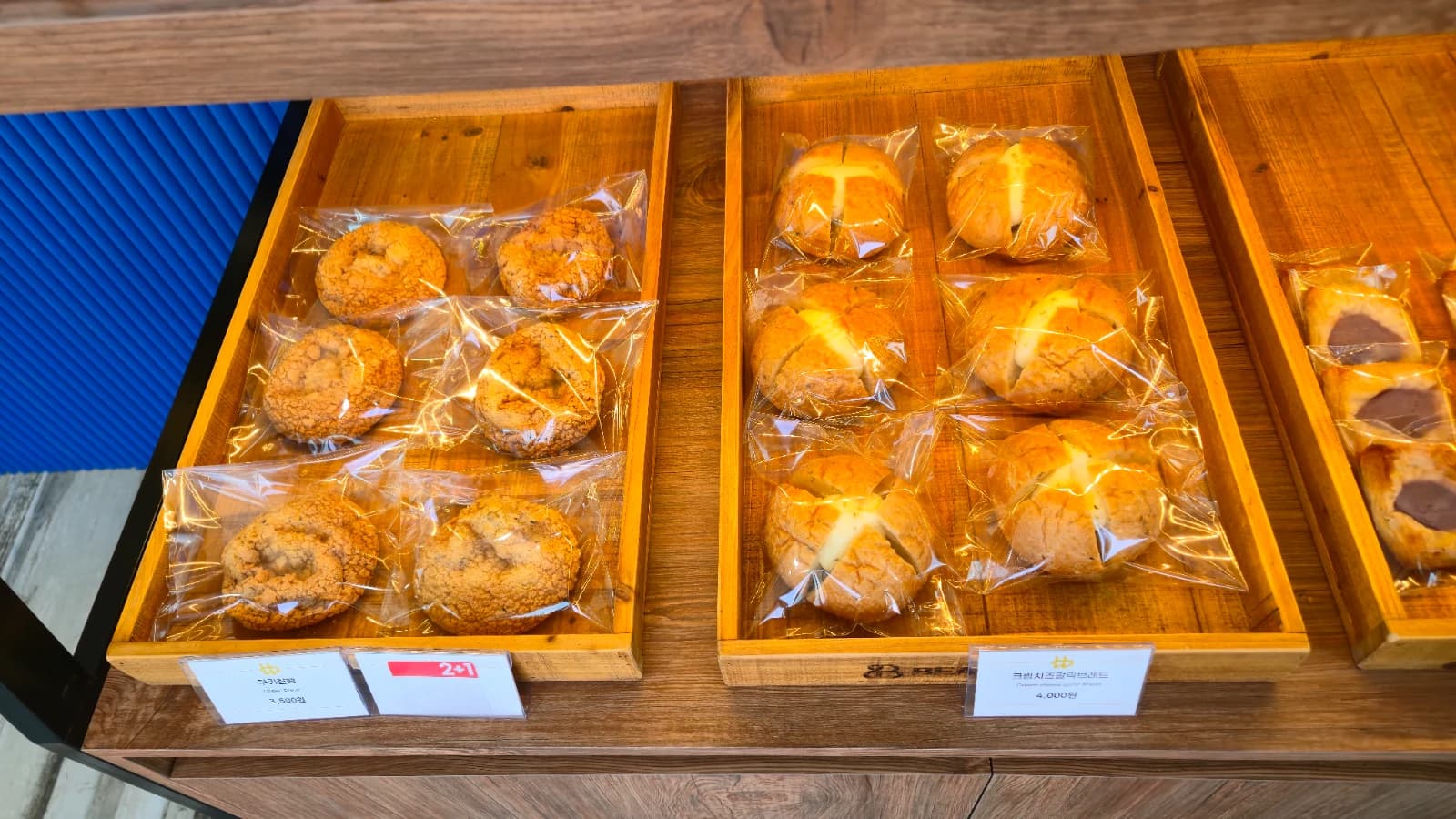 Sagwadang cafe interior with bread displayed on wooden trays