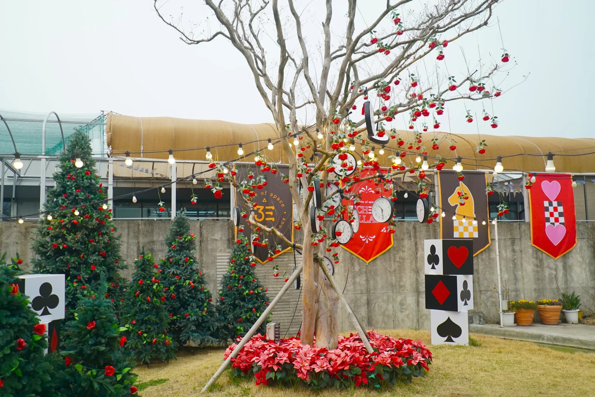 Tea party booth photo spot with teacup garlands and rabbit decorations at 3Cheon Village