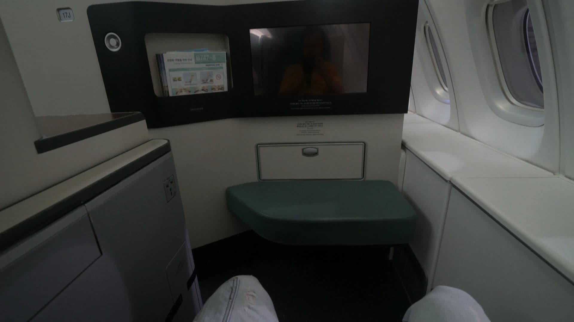 Korean Air Boeing 747-8i upper deck Prestige Class 2-2 configuration window seat overview with deep blue upholstery