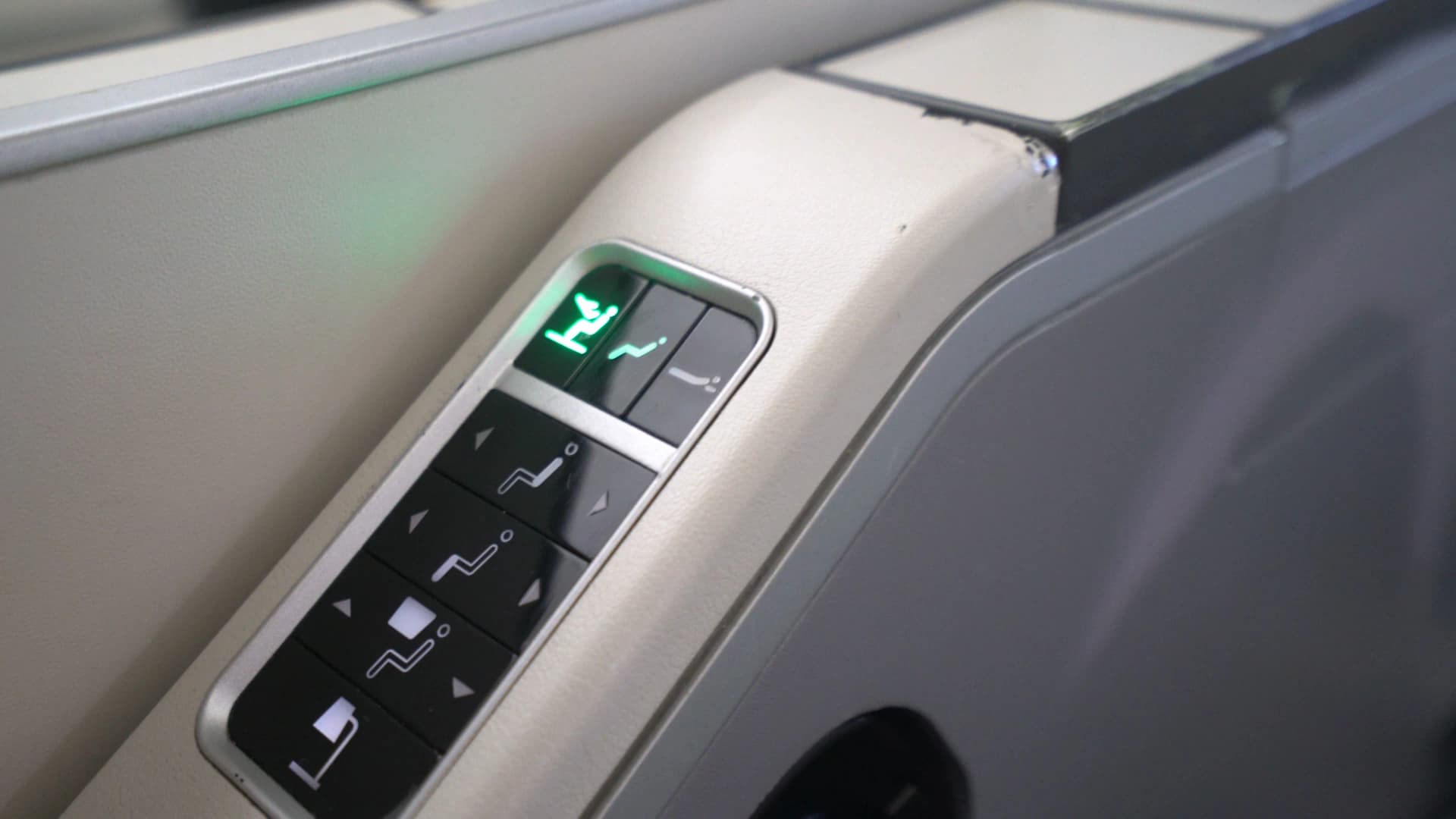 Seat adjustment control panel for lie-flat positioning on Korean Air 747-8i Prestige Class armrest