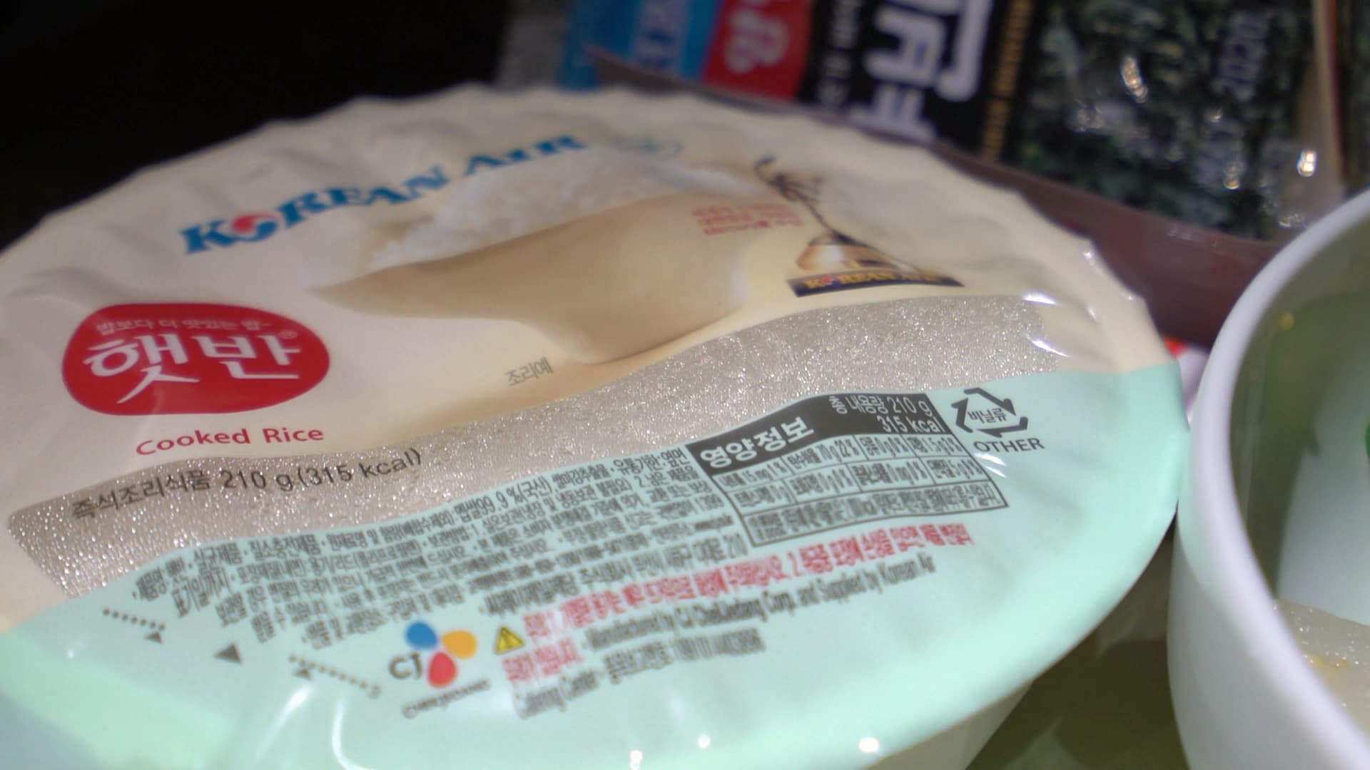 Korean Air branded instant rice with evenly cooked sticky grains served alongside bibimbap